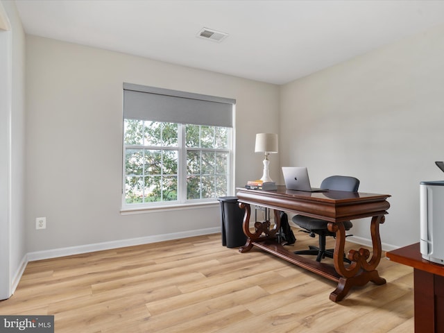 home office featuring light hardwood / wood-style flooring