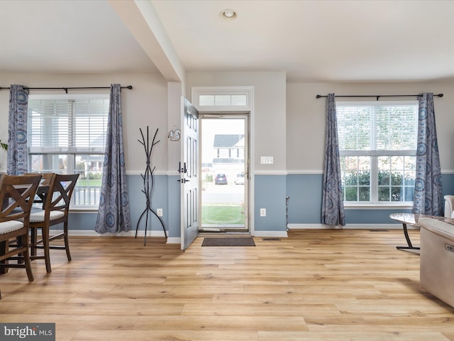 entrance foyer featuring light wood-type flooring