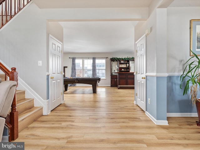 corridor featuring light wood-type flooring