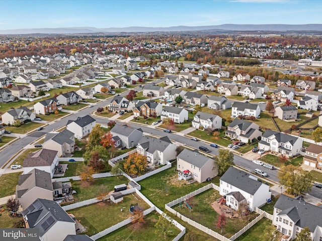 drone / aerial view featuring a mountain view