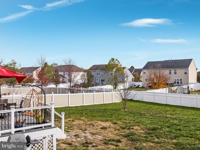 view of yard featuring a wooden deck