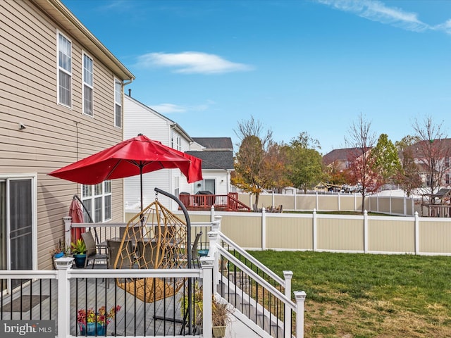 view of yard featuring a deck