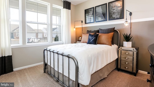 bedroom featuring light carpet