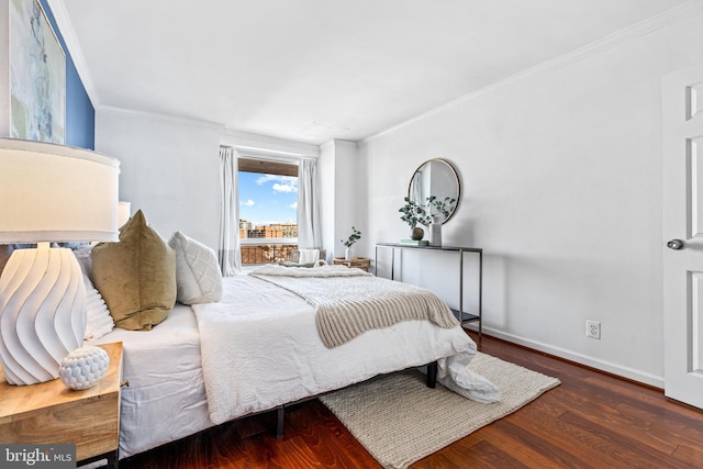 bedroom featuring ornamental molding and dark hardwood / wood-style floors