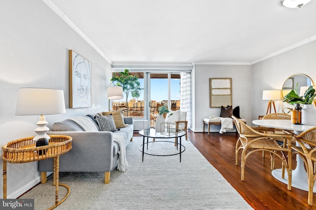 living room featuring ornamental molding and dark wood-type flooring