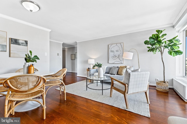 living room featuring dark wood-type flooring, crown molding, and radiator