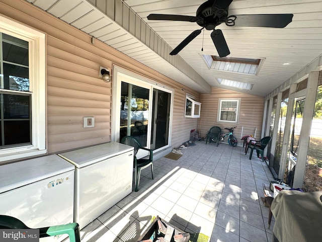 view of patio featuring ceiling fan