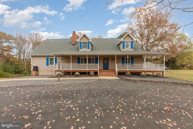 farmhouse inspired home featuring a porch