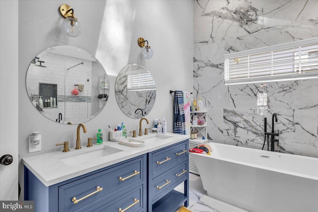 bathroom featuring a bath and vanity