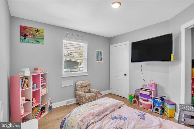 bedroom featuring light hardwood / wood-style floors