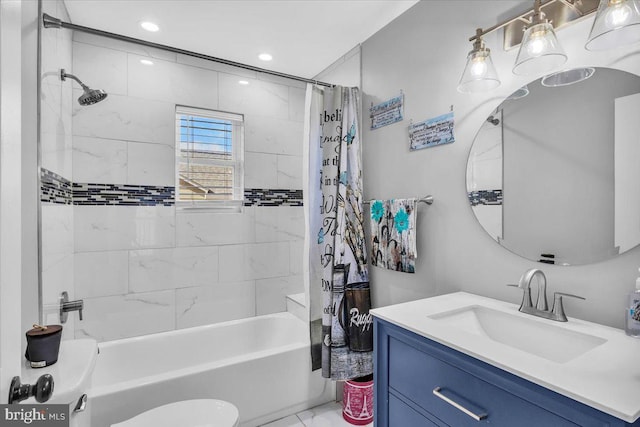 full bathroom featuring toilet, shower / tub combo, and vanity