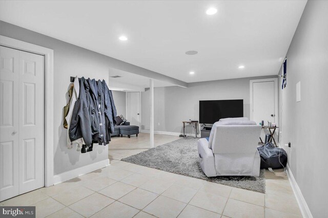 living room featuring light tile patterned floors