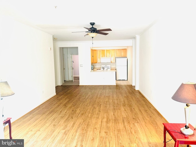 unfurnished living room with ceiling fan, ornamental molding, and light hardwood / wood-style flooring