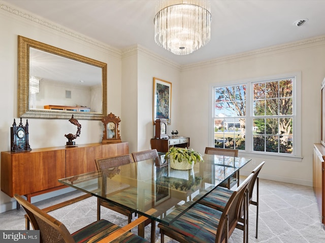 carpeted dining room with an inviting chandelier and crown molding