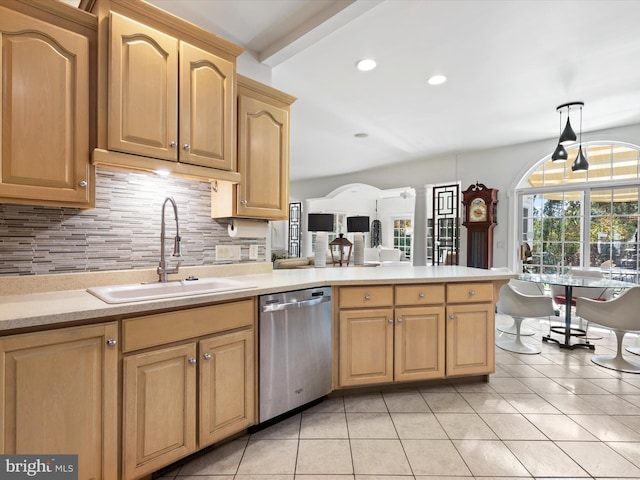 kitchen featuring light tile patterned floors, tasteful backsplash, sink, stainless steel dishwasher, and pendant lighting