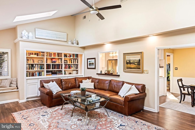 living room featuring ceiling fan, high vaulted ceiling, built in shelves, and dark hardwood / wood-style flooring