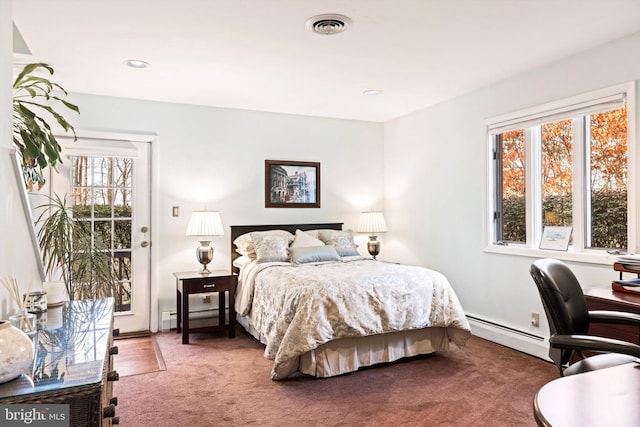 carpeted bedroom with access to outside and a baseboard radiator