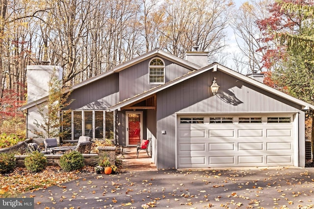 front of property with a garage