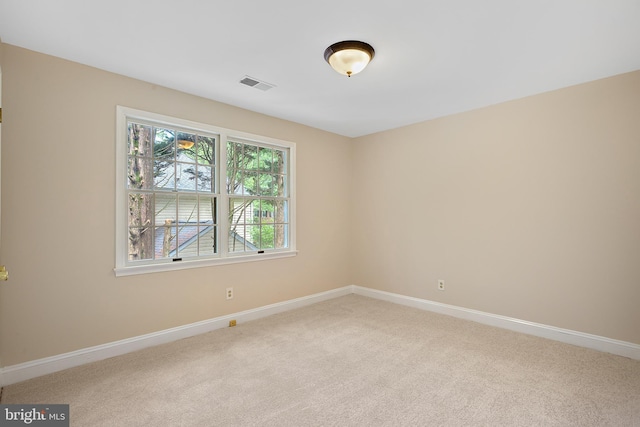 view of carpeted spare room