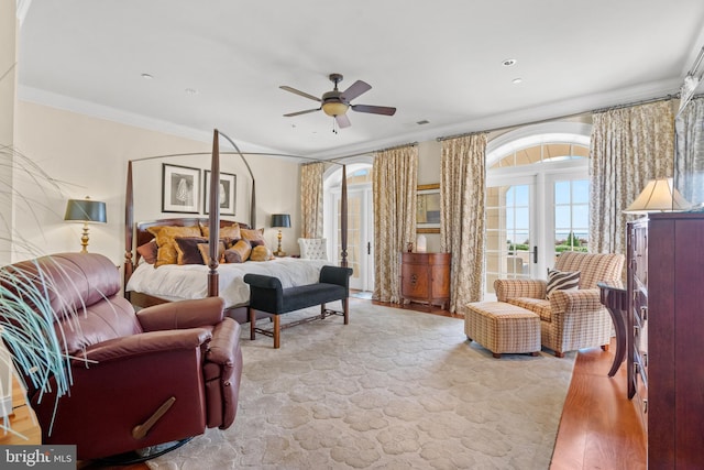 bedroom featuring ceiling fan and ornamental molding