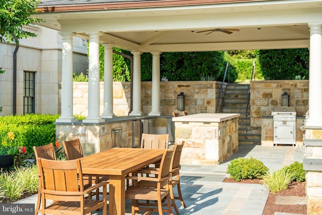 view of patio / terrace featuring ceiling fan, area for grilling, and a gazebo