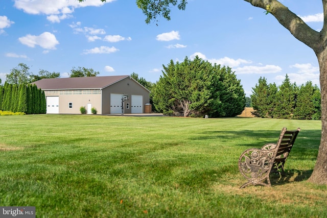 view of yard featuring a garage