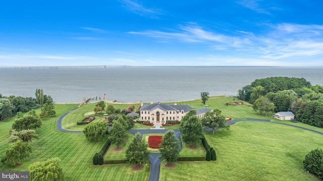 birds eye view of property featuring a water view