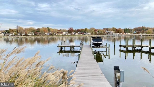 dock area featuring a water view