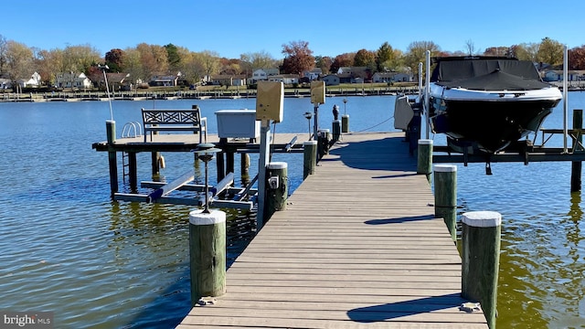 dock area featuring a water view