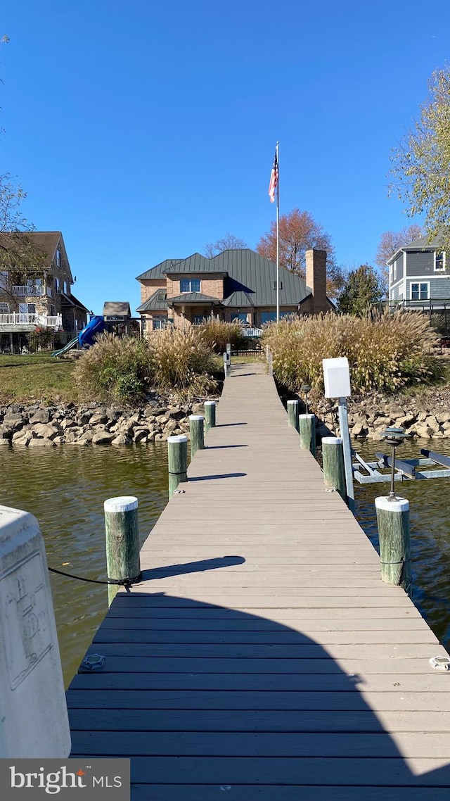 view of dock with a water view