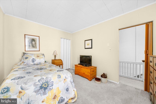 bedroom featuring light carpet and crown molding