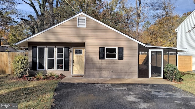 exterior space featuring a sunroom