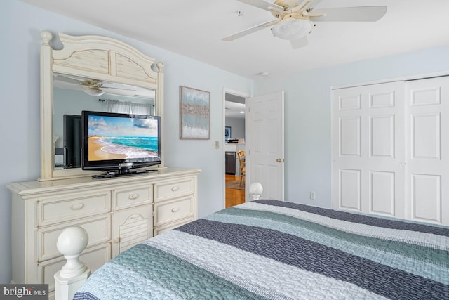 bedroom with ceiling fan and a closet