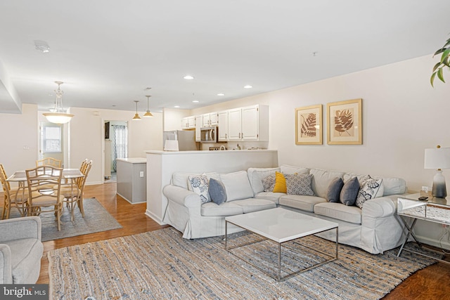 living room with light hardwood / wood-style floors