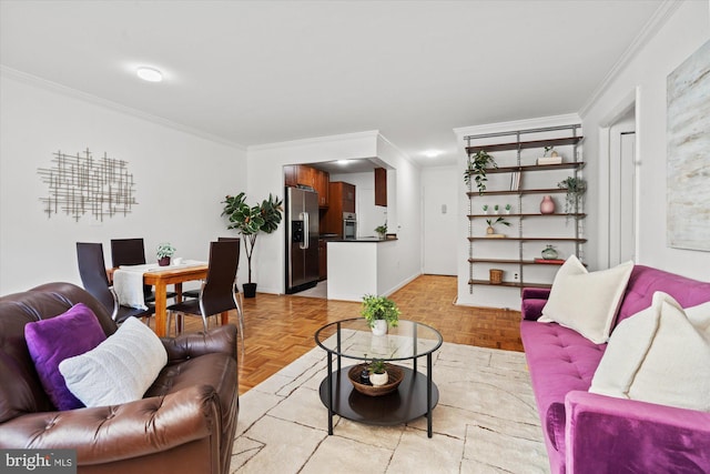 living room featuring crown molding and light parquet flooring