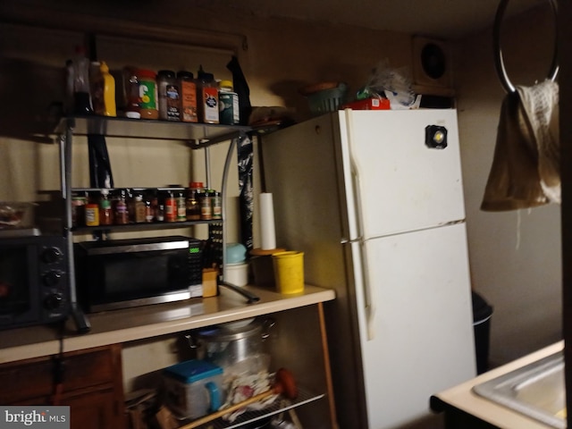 kitchen with white fridge