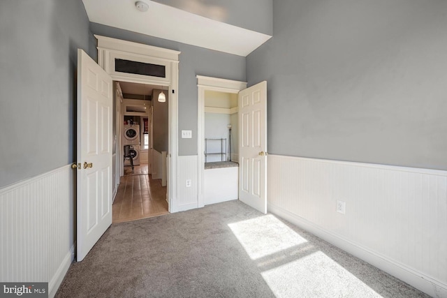 unfurnished bedroom featuring carpet flooring