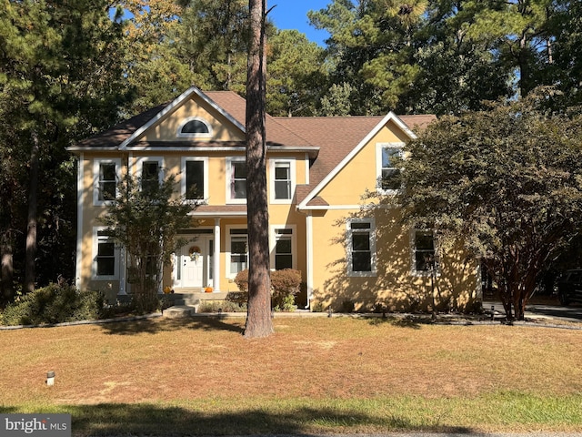 view of front of property with a front yard