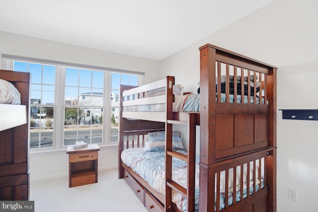 bedroom with light carpet