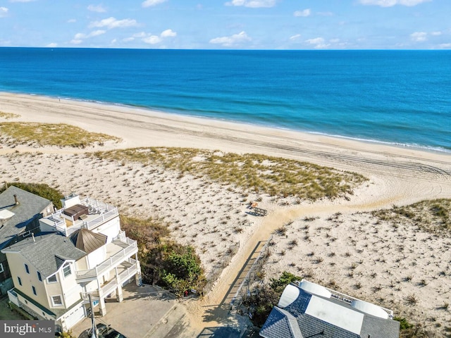 property view of water featuring a beach view