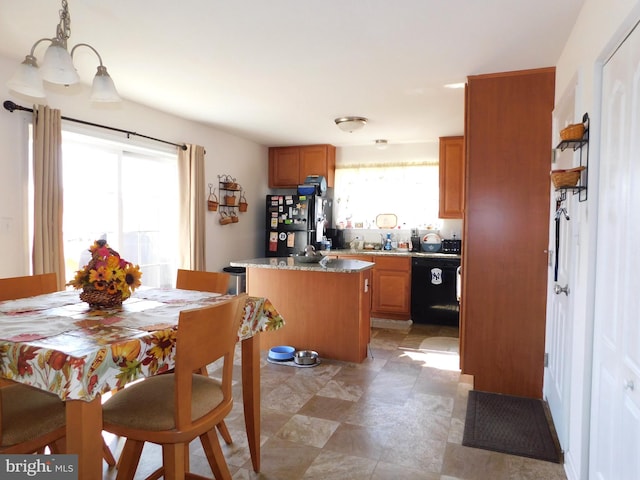 dining area with plenty of natural light