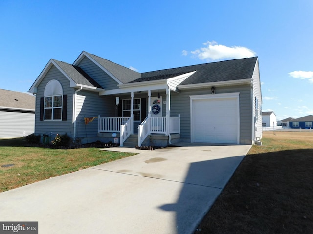 ranch-style home featuring a garage, a front lawn, and covered porch