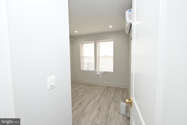 unfurnished room featuring light hardwood / wood-style floors