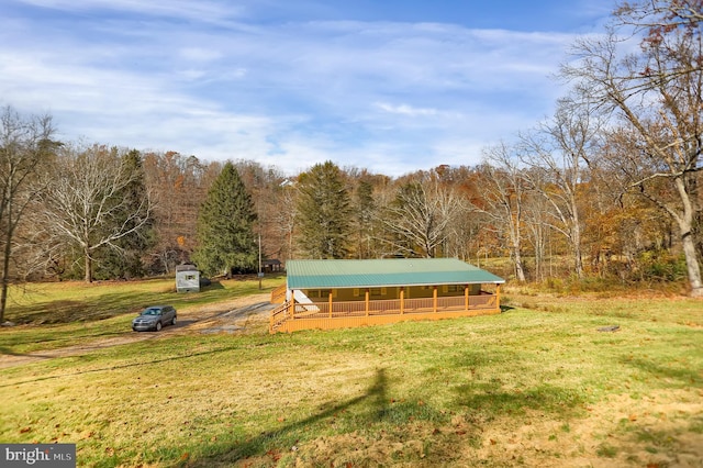 view of front of house with an outdoor structure