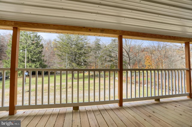 deck featuring a lawn