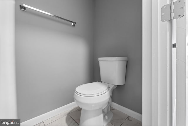 bathroom featuring toilet