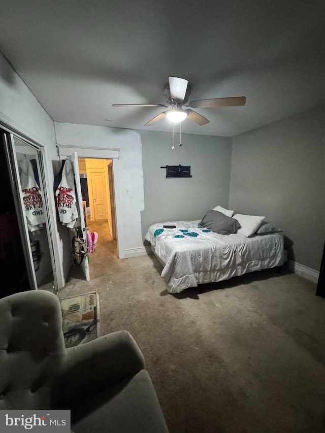 bedroom featuring ceiling fan and carpet floors