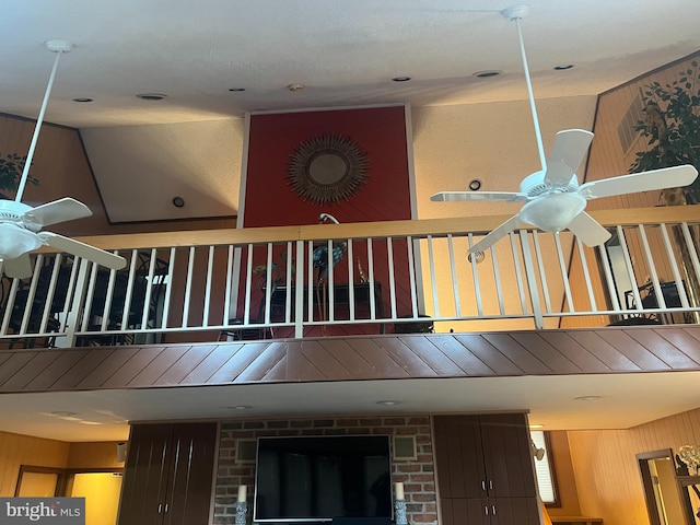 staircase with ceiling fan