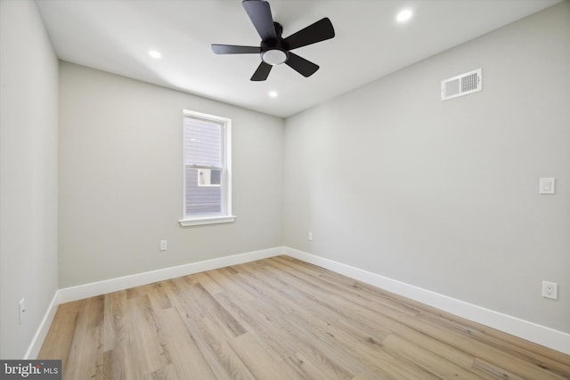 unfurnished room with ceiling fan and light hardwood / wood-style flooring