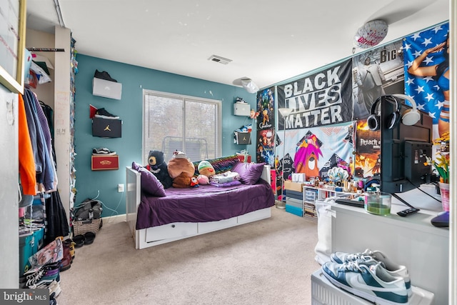 bedroom featuring carpet floors